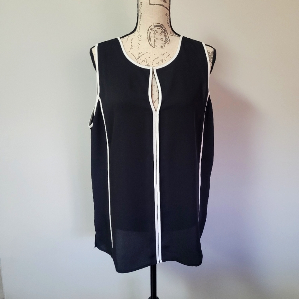 White House Black Market B/W sleeves blouse in XL.